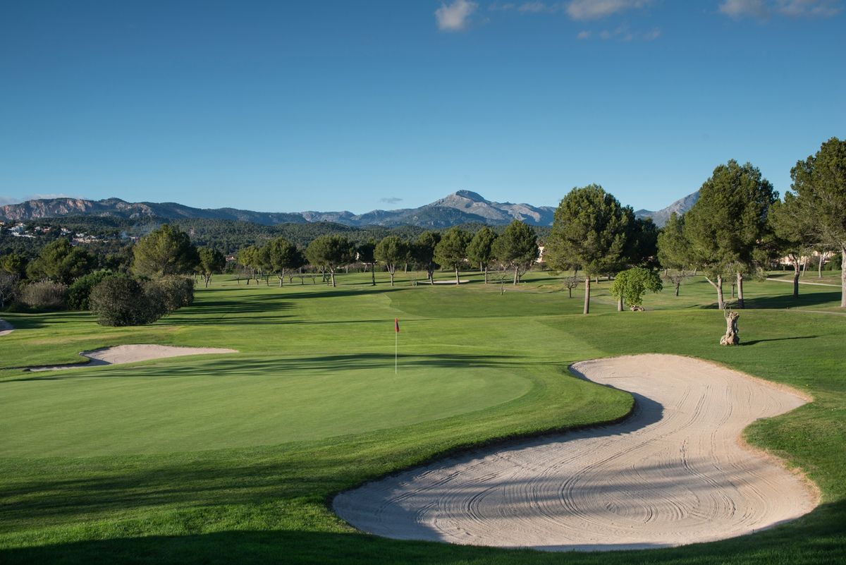 Sand bunker in front of a green with mountain view at Golf Santa Ponsa I, Mallorca