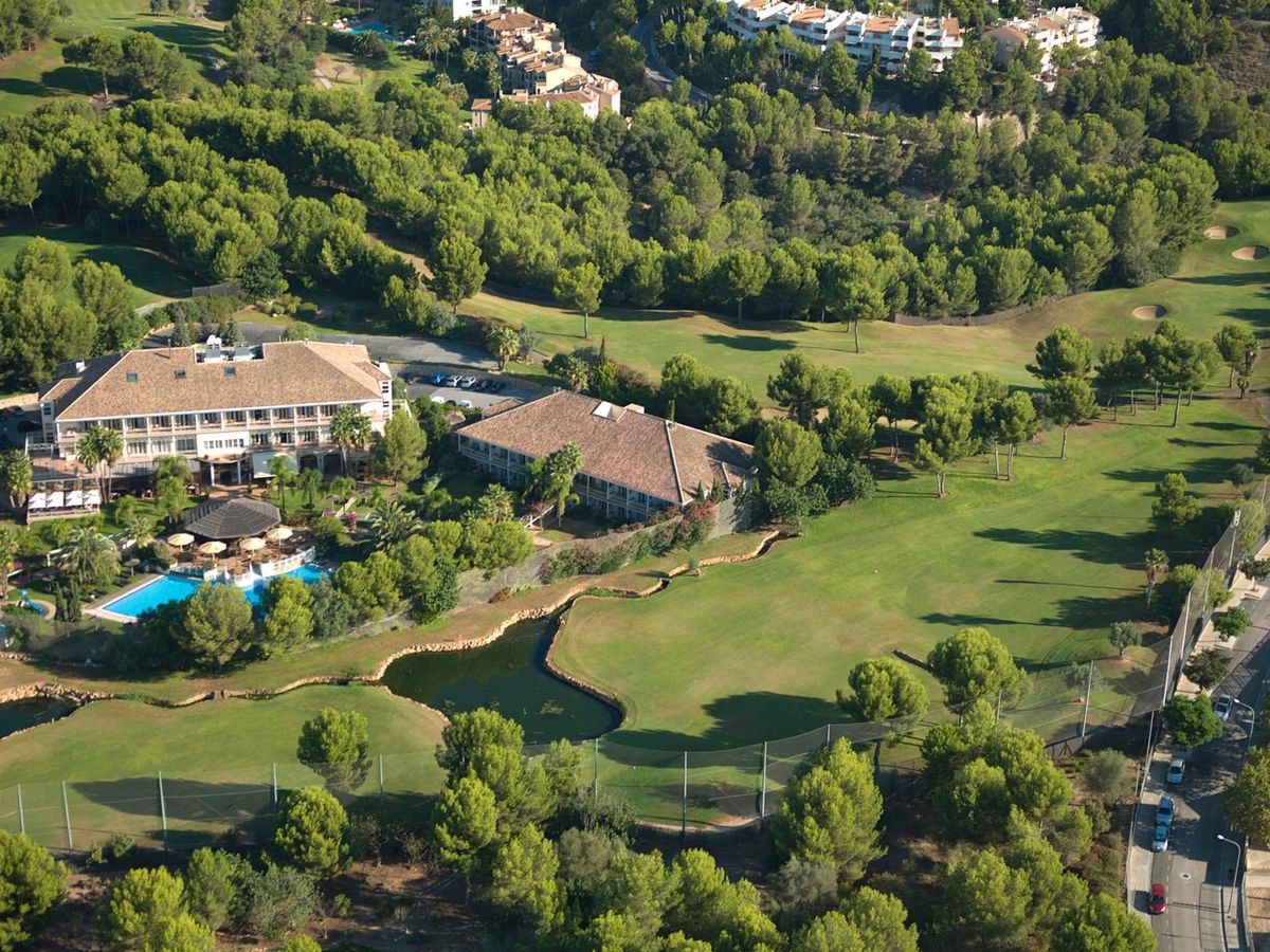Aerial view of the Lindner Hotel Mallorca Portals Nous beside the golf course