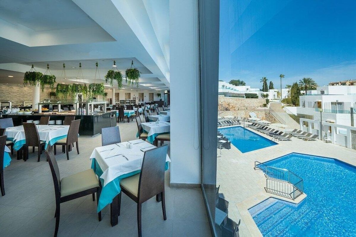 Restaurant with terrace and pool view at MarSenses Ferrera Blanca Hotel, Mallorca