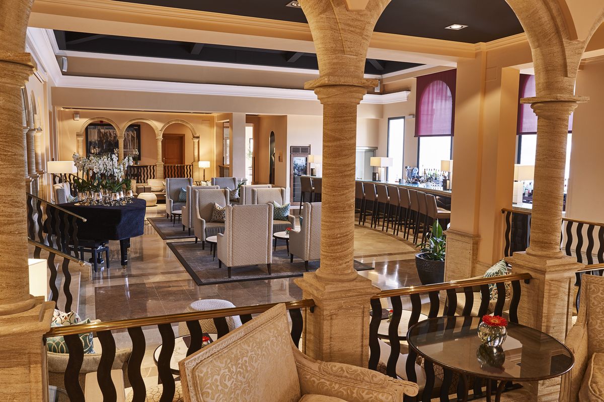 Restaurant with columns and lounge area at Steigenberger Hotel Camp de Mar, Mallorca