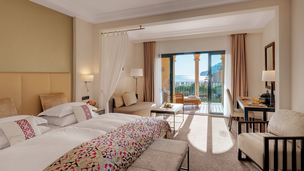 Bedroom with balcony and sea view at Steigenberger Hotel Camp de Mar, Mallorca