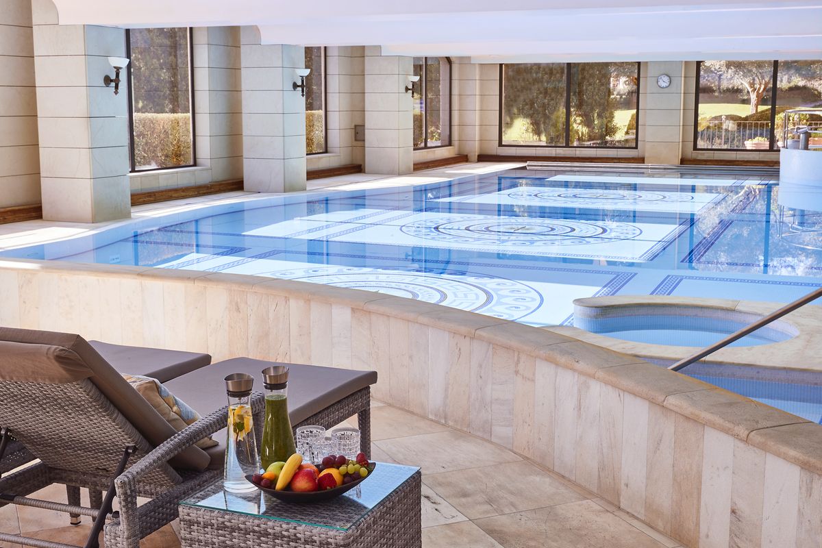 Indoor spa pool with sun lounger at Steigenberger Hotel Camp de Mar, Mallorca