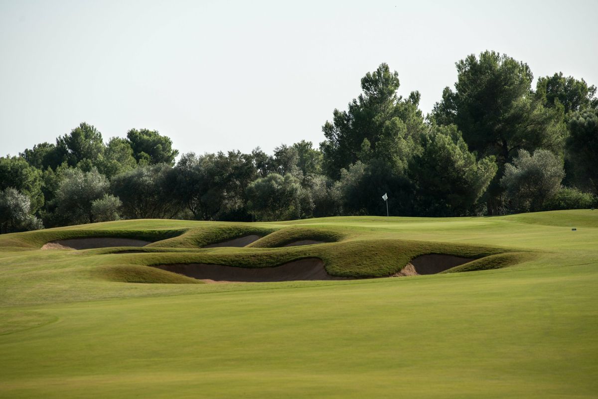 Sculpted bunkers around a green at T-Golf Palma Puntiró, Mallorca