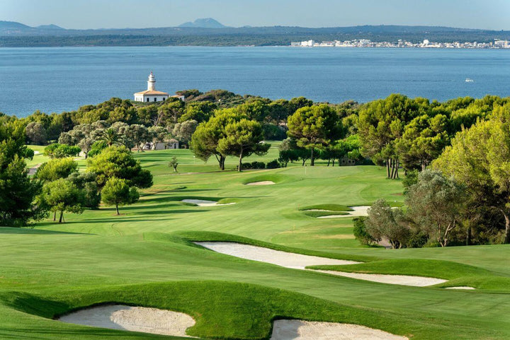 Rent2Play.Golf Alcanada 18-hole green fee at a scenic golf course with lush fairways and greens.