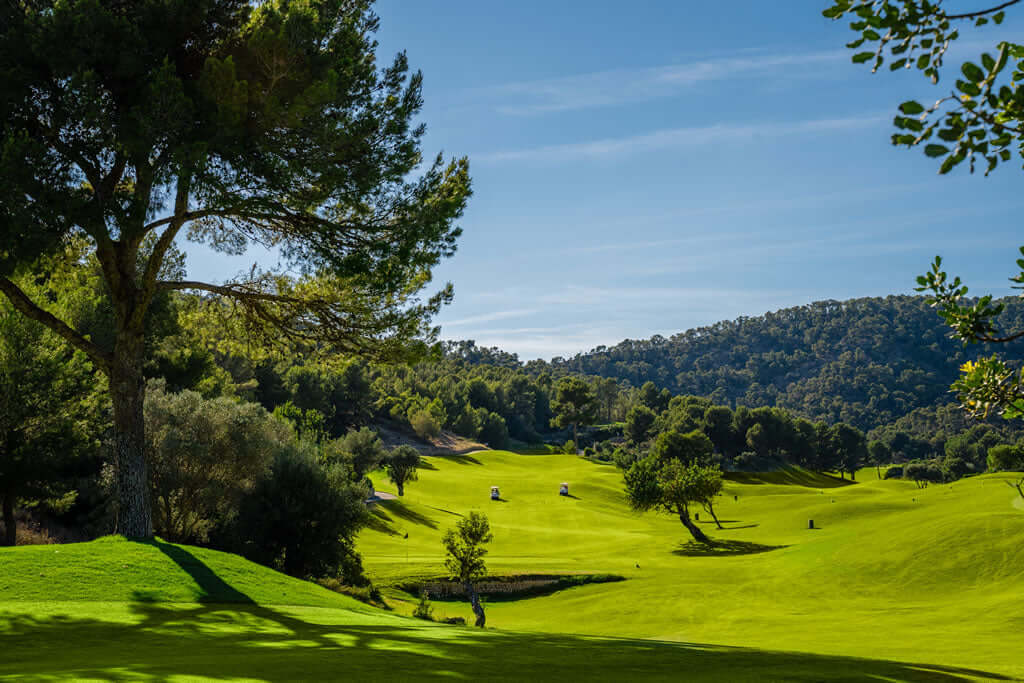 Rent2Play.Golf 18-hole Green Fee at Golf de Andratx featuring lush fairways and scenic views on the picturesque golf course.